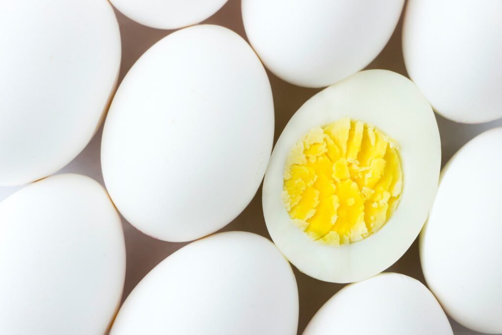 white egg lot on brown wooden table